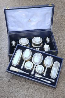 A SPLENDID AND COMPLETE GEORGE V SILVER TOILET SERVICE, CRICHTON BROTHERS, 