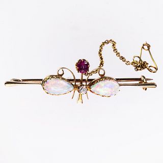 A VICTORIAN OPAL BAR BROOCH, the two oval opals and single ruby and diamond