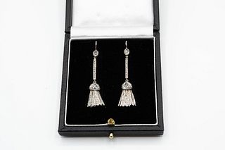 A PAIR OF ART DECO STYLE DIAMOND EARRINGS, the tasselled mount with domed d