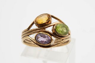 FOUR 9CT YELLOW GOLD RINGS, all set with gemstones to include amethyst, gar