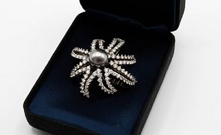 A CULTURED PEARL AND DIAMOND BROOCH BY TIFFANY & CO, from the "Fireworks" c