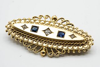 A VICTORIAN SAPPHIRE AND DIAMOND SWEETHEART BROOCH, the scrolling and beade