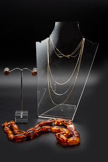 AN AMBER BEAD NECKLACE, of graduating amber beads, a pair of amber and silv