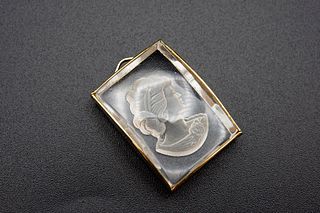 A YELLOW METAL MOUNTED GLASS INTAGLIO PENDANT, rectangular, carved with the