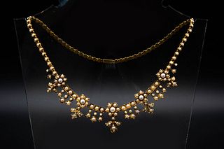 A MID VICTORIAN SEED PEARL NECKLACE, comprising of five graduating flower h