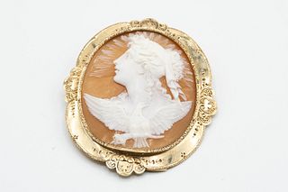 A VICTORIAN SHELL CAMEO BROOCH, carved to the centre with the profile of a 