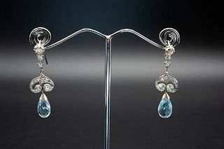 A PAIR OF AQUAMARINE AND DIAMOND EARRINGS, the faceted aquamarine bead to t