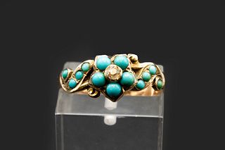 AN EARLY VICTORIAN TURQUOISE SET RING, the flower head shaped mount and scr