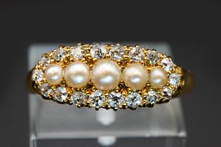 A LATE VICTORIAN SEED PEARL AND DIAMOND RING, the five graduating seed pear