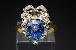 AN EARLY 19TH CENTURY SAPPHIRE AND DIAMOND RING, the old pear cut sapphire 