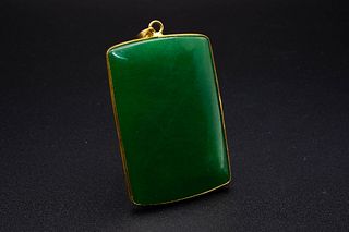 A NEPHRITE PLAQUE, the large square cut nephrite plaque suspending from an 