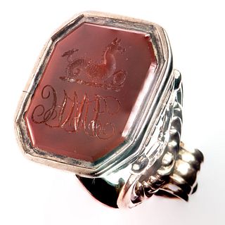 A VICTORIAN CARVED CARNELIAN SEAL FOB, the carved carnelian plaque set in a