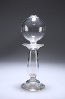 A LACE MAKER'S GLASS LAMP, 18TH/19TH CENTURY, with folded foot and baluster