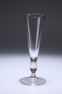 A LIGHT BALUSTER ALE FLUTE, 18TH CENTURY, with conical bowl and folded foot