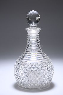 AN EARLY 19TH CENTURY CUT-GLASS DECANTER, PROBABLY IRISH, with prism-cut bo