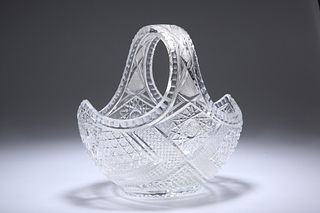 AN EARLY 20TH CENTURY CUT-GLASS BASKET, with star-cutting. 23.5cm wide