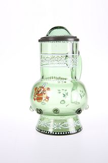 AN ENAMELLED GREEN GLASS ARMORIAL STEIN, C.1900, with domed hinged cover. 1