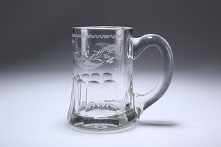 AN ENGLISH GLASS ALE TANKARD, 19TH CENTURY, engraved with barley. 14cm