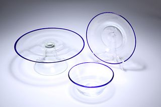 A BLUE-RIMMED GLASS BOWL AND UNDERPLATE, PROBABLY VENETIAN, each with polis