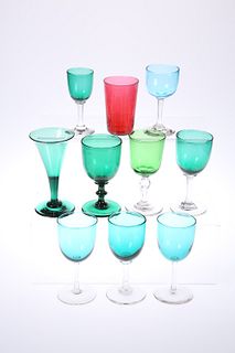 A GROUP OF TEN 19TH CENTURY COLOURED DRINKING GLASSES, mostly green. (10)