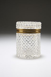A FRENCH GILT-BRASS MOUNTED CUT-GLASS BOX, PROBABLY BACCARAT, cylindrical, 
