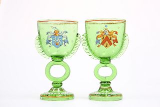 A PAIR OF BOHEMIAN ENAMEL PAINTED MARRIAGE GLASSES, in green glass, each wi