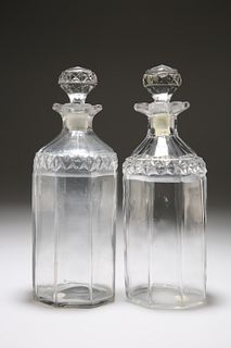 A PAIR OF CUT-GLASS DECANTERS, c. 1800, octagonal, each with faceted stoppe