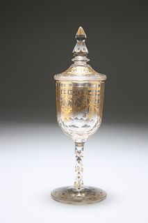 A SMALL BOHEMIAN GILT-DECORATED GOBLET AND COVER, 19th CENTURY, the faceted