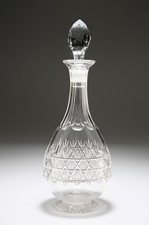 A CUT-GLASS DECANTER OF FLASK FORM, EARLY 20th CENTURY, with faceted stoppe