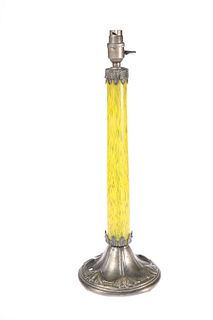 AN ART NOUVEAU METAL-MOUNTED GLASS TABLE LAMP, CIRCA 1900, with streaky yel