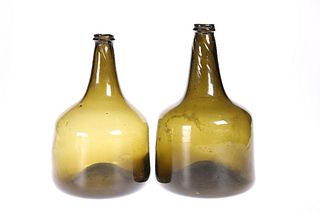 TWO LATE 18th CENTURY OLIVE GREEN GLASS BOTTLES, each of shaped mallet form
