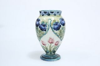 WILLIAM MOORCROFT FOR JAMES MACINTYRE & CO
 A "ROSE AND TULIP" PATTERN VASE