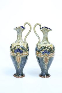 A PAIR OF ROYAL DOULTON STONEWARE EWERS, CIRCA 1902-1922, with crimped neck