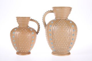 TWO DOULTON LAMBETH SILICON WARE JUGS, each of shouldered ovoid form, with 
