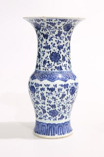 A CHINESE BLUE AND WHITE MING-STYLE VASE, 18TH CENTURY, painted with flower