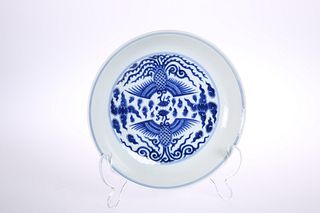 A CHINESE BLUE AND WHITE "DOUBLE PHOENIX" DISH, circular, painted to the we