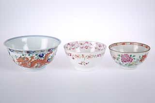 THREE CHINESE PORCELAIN BOWLS, the first painted in a Famille Verte palette