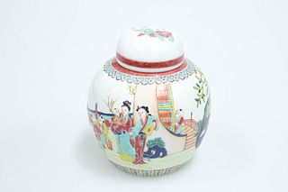A CHINESE PORCELAIN JAR AND COVER, in the famille rose palette, painted wit