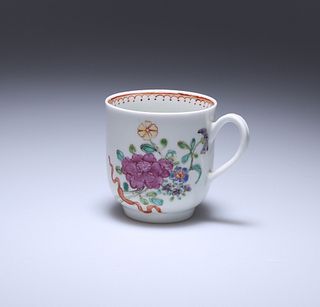 A WORCESTER POLYCHROME FLORAL PAINTED COFFEE CUP, c. 1770, painted with a r