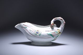 A VERY RARE WORCESTER PORCELAIN POLYCHROME LEAF SAUCE BOAT WITH CONJOINED L