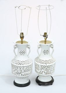 A PAIR OF CHINESE BLANC DE CHINE RETICULATED TABLE LAMPS, the necks applied