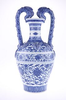 A CHINESE BLUE AND WHITE PORCELAIN TWO-HANDLED AMPHORA, in Ming style, surm