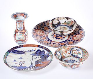 A GROUP OF JAPANESE IMARI, comprising two chargers, two bowls and a vase, l