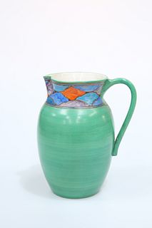 AN ART DECO HAND-PAINTED POTTERY JUG, with green ground and painted neck, i