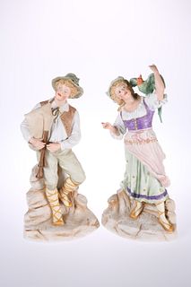 A LARGE PAIR OF HEUBACH BISQUE PORCELAIN FIGURES, CIRCA 1900, modelled as a