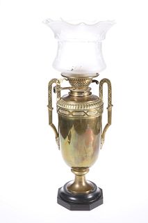 A BRASS LAMP, CIRCA 1900, the vasiform body with twin handles, Messengers P