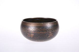 AN ISLAMIC COPPER TUMBLER BOWL, probably 19th Century, with good original p