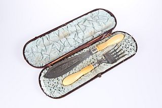 A CASED PAIR OF LATE VICTORIAN IVORY-HANDLED SILVER-PLATED FISH SERVERS, th