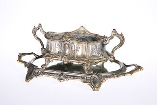 A CONTINENTAL WHITE METAL TABLE TOP JARDINIERE ON STAND, c. 1900, in the Ar