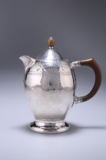LIBERTY & CO., A SILVER HOT WATER JUG, BIRMINGHAM 1919, ovoid, the domed co